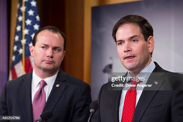 Sen. Marco Rubio speaks next to Sen. Mike Lee during a news conference to introduce their proposal for an overhaul of the tax code, March 4, 2015 on...