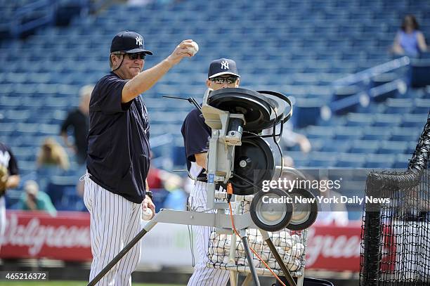 Bullpen Coach Gary Tuck. Intrasquad game played with a pitching machine, nicknamed 'Iron Mike'. Yankees Spring Training, George M. Steinbrenner...