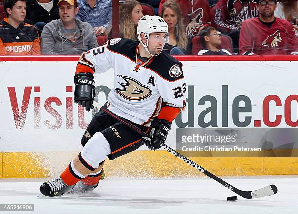 Francois Beauchemin of the Anaheim Ducks skates with the puck during the NHL game against the Arizona Coyotes at Gila River Arena on March 3, 2015 in...