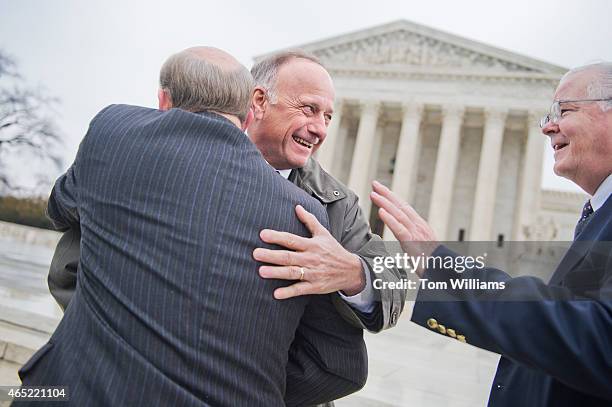 From left, Reps. Louie Gohmert, R-Texas, Steve King, R-Iowa, and Joe Barton, R-Texas, attend a rally outside of the Supreme Court during arguments in...