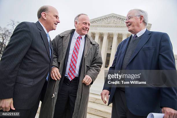 From left, Reps. Louie Gohmert, R-Texas, Steve King, R-Iowa, and Joe Barton, R-Texas, attend a rally outside of the Supreme Court during arguments in...
