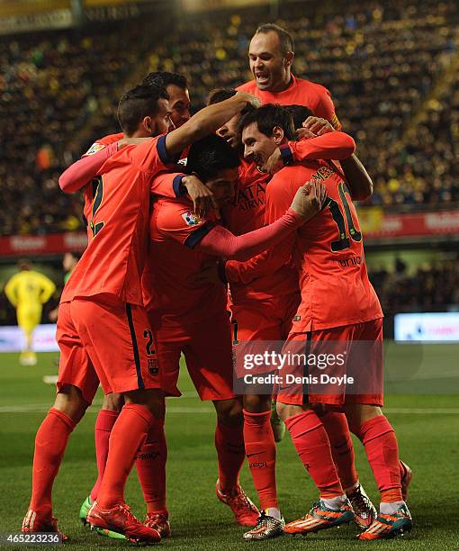 Neymar of FC Barcelona celebrates with Lionel Messi and Andres Iniesta after scoring his team's opening goal during the Copa del Rey Semi-Final,...