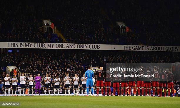 Players and fans observe a minute's applause to remember ex-Spurs legend Dave Mackay prior to the Barclays Premier League match between Tottenham...