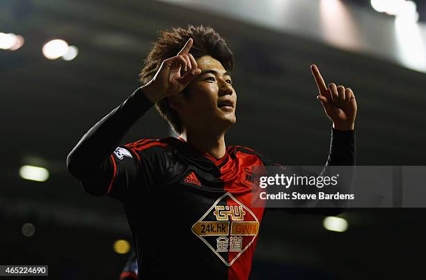 Ki Sung-Yueng of Swansea City celebrates as he scores their first and equalising goal during the Barclays Premier League match between Tottenham...