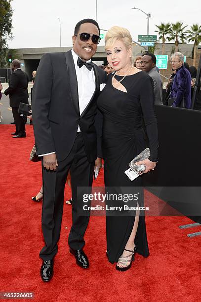 Recording artist Charlie Wilson and Mahin Tat attend the 56th GRAMMY Awards at Staples Center on January 26, 2014 in Los Angeles, California.