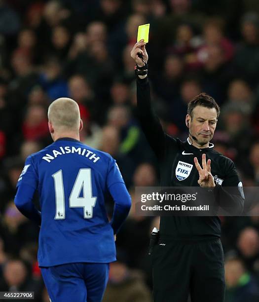 Steven Naismith of Everton is booked by Referee Mark Clattenburg during the Barclays Premier League match between Stoke City and Everton at Britannia...