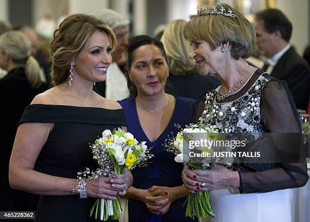 Angelica Rivera , wife of Mexican President Enrique Pena Nieto, speaks with Gilly Yarrow, the wife of the Lord Mayor of London, as she attends a...