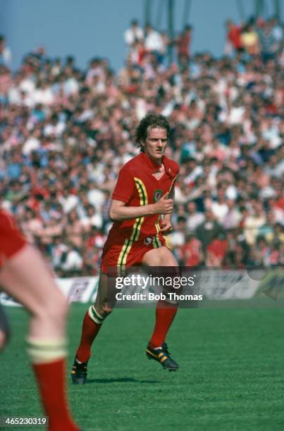 Welsh footballer Nick Deacy of PSV Eindhoven and Wales, in action for his national side, circa 1977.