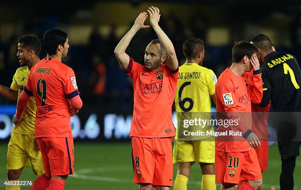 Andres Iniesta of FC Barcelona applauds the supporters as he celebrates winning the Copa del Rey semi-final second leg match between Villarreal CF...