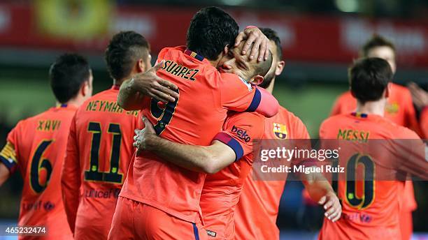 Luis Suarez of FC Barcelona celebrates with his team-mate Mascherano as he scored the second goal during the Copa del Rey semi-final second leg match...