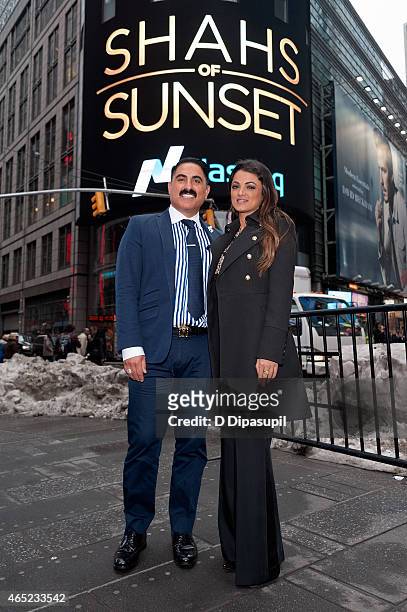 Reza Farahan and Golnesa "GG" Gharachedaghi of the "Shahs of Sunset" ring the NASDAQ Closing Bell at NASDAQ MarketSite on March 4, 2015 in New York...
