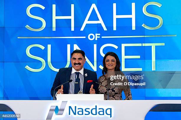 Reza Farahan and Golnesa "GG" Gharachedaghi of the "Shahs of Sunset" ring the NASDAQ Closing Bell at NASDAQ MarketSite on March 4, 2015 in New York...