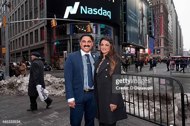 Reza Farahan and Golnesa "GG" Gharachedaghi of the "Shahs of Sunset" ring the NASDAQ Closing Bell at NASDAQ MarketSite on March 4, 2015 in New York...