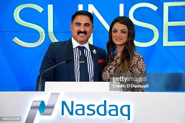 Reza Farahan and Golnesa "GG" Gharachedaghi of the "Shahs of Sunset" ring the NASDAQ Closing Bell at NASDAQ MarketSite on March 4, 2015 in New York...