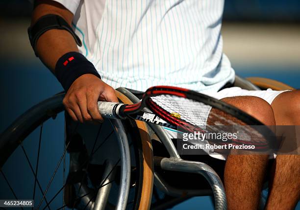 Detailed view of Shingo Kunieda of Japan during his doubles match with partner Stephane Houdet of France during the 2014 Australian Open Wheelchair...