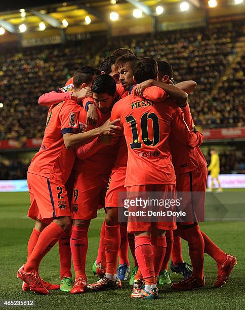 Neymar of FC Barcelona celebrates with teammates after scoring his team'sb opening goal during the Copa del Rey Semi-Final, Second Leg match between...
