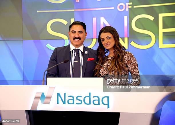 Reality TV show personalities Reza Farahan and Golnesa 'GG' Gharachedaghi ring the closing bell at NASDAQ MarketSite on March 4, 2015 in New York...