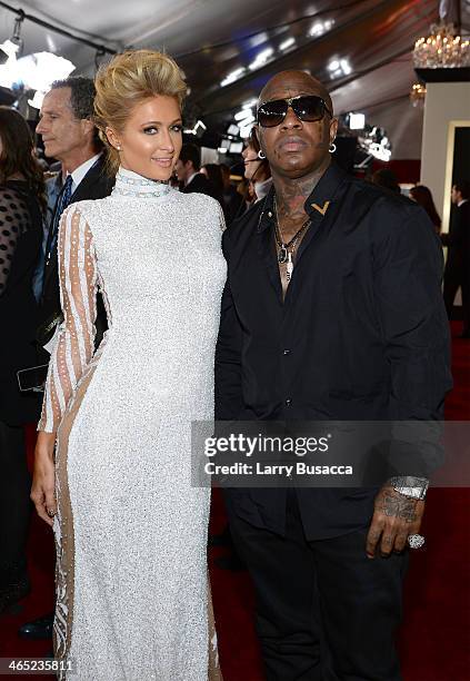 Paris Hilton and rapper Birdman attend the 56th GRAMMY Awards at Staples Center on January 26, 2014 in Los Angeles, California.