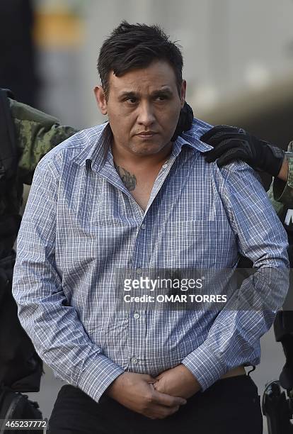 The alleged leader of the Zetas drug carteL, Oscar Omar Trevino, aka "Z-42" is taken under custody to be presented to the press at the Attorney...