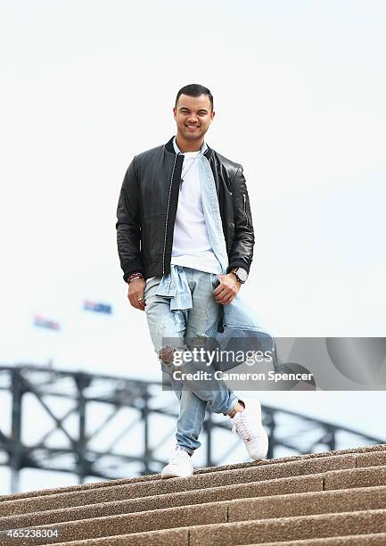 Guy Sebastian poses after being announced as the Australian representative in the 2015 Eurovision Song Contest at the Sydney Opera House on March 5,...
