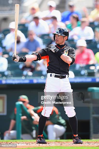 Ichiro Suzuki of the Miami Marlins is seen at bat during the exhibition game against the University of Miami Hurricanes during the spring training at...