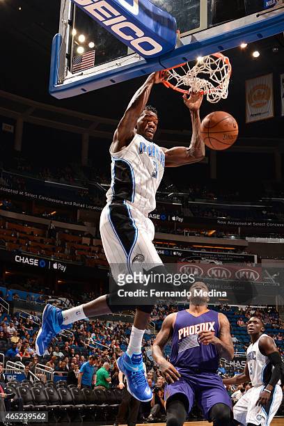 Luke Ridnour of the Orlando Magic dunks against the Phoenix Suns during the game on March 4, 2015 at Amway Center in Orlando, Florida. NOTE TO USER:...