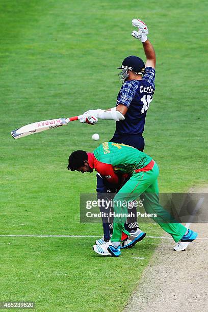 Kyle Coetzer of Scotland runs in to Sabbir Rahman of Bangladesh during the 2015 ICC Cricket World Cup match between Bangladesh and Scotland at Saxton...