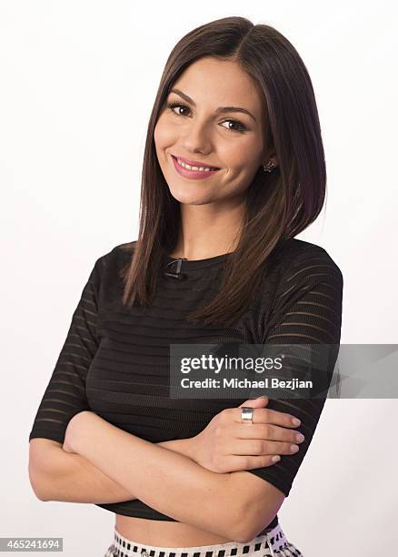 Actress Victoria Justice poses for a portrait as she visits The Lowdown With Diana Madison on March 4, 2015 in Hollywood, California.