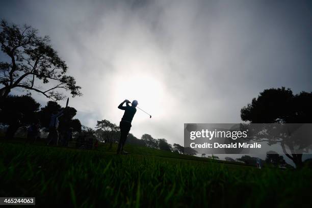 Sung-Moon Bae of South Korea hits a tee shot on the 2nd hole during the final round of the Farmers Insurance Open on Torrey Pines South on January...