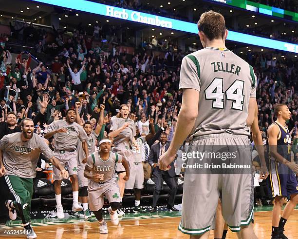 Tyler Zeller of the Boston Celtics celebrates after hitting the game winning shot against the Utah Jazz on March 4, 2015 at TD Garden in Boston,...