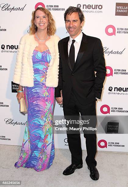 Eric McCormack and wife Janet McCormack arrive at the 23rd Annual Elton John AIDS Foundation Academy Awards Viewing Party at The City of West...