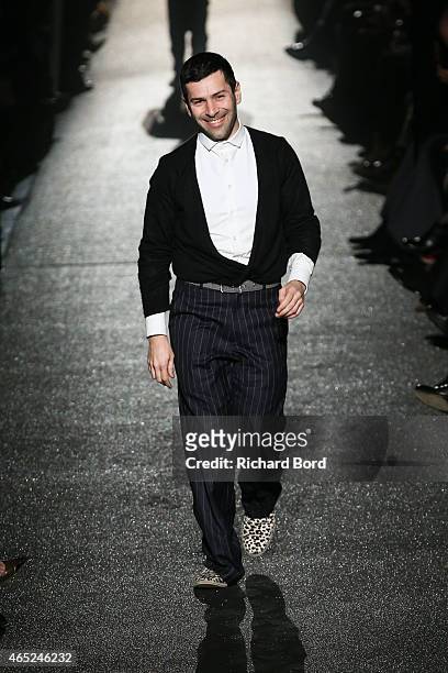 Designer Alexis Mabille acknowledges the audience after the Alexis Mabille show as part of the Paris Fashion Week Womenswear Fall/Winter 2015/2016 at...