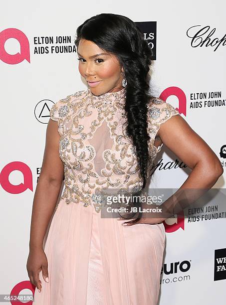 Lil' Kim attends the 23rd Annual Elton John AIDS Foundation Academy Awards Viewing Party on February 22, 2015 in West Hollywood, California.