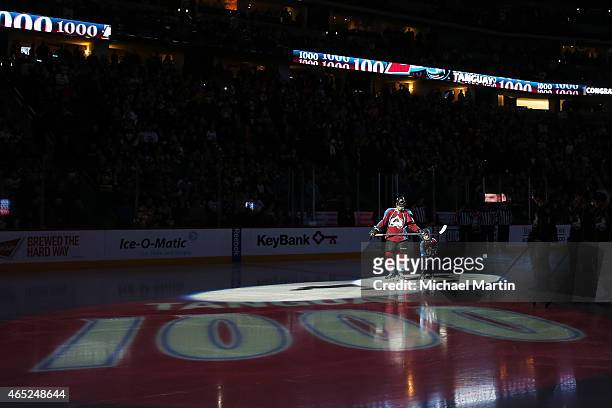 Alex Tanguay of the Colorado Avalanche skates with his son Samuel prior to his 1000th career NHL game against the Pittsburgh Penguins at the Pepsi...