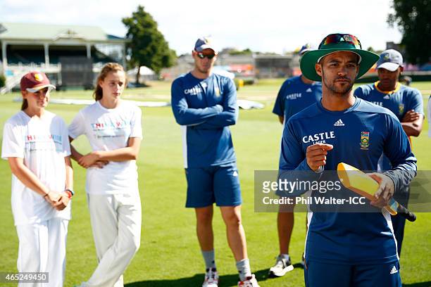 Duminy of South Africa speaks during a Charity Training and Coaching Session at Eden Park 2 on March 5, 2015 in Auckland, New Zealand.