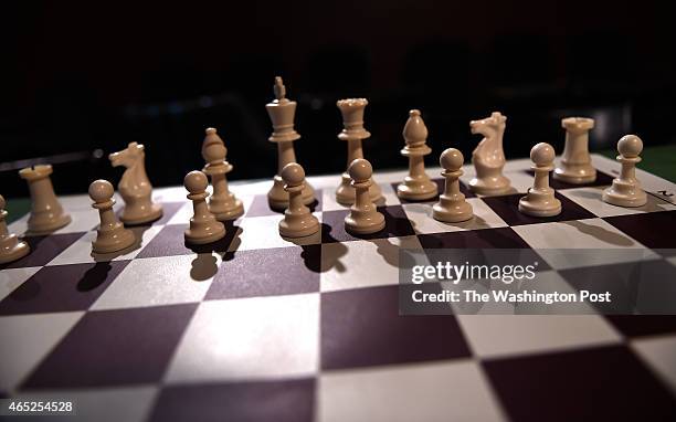 Chess master and teacher, Majur Juac, once a lost bot of Sudan, has his pieces seth on the board on February 3, 2015 in New York, NY.