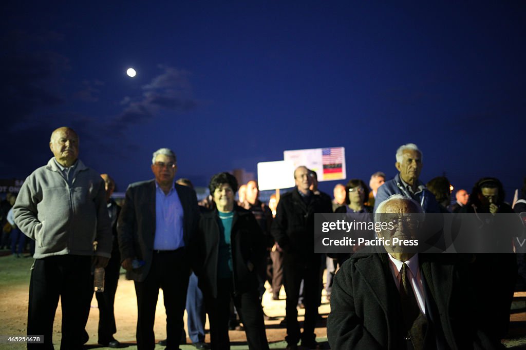 Old protester sitting in a chair in a demonstration against...