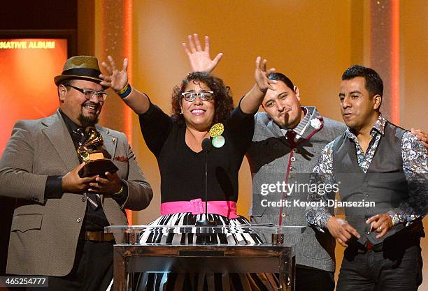 Musicians Miguel Ramirez, La Marisoul, Alex Bendana, and Jose Carlos of La Santa Cecilia accept the Best Latin Rock Urban or Alternative Album award...