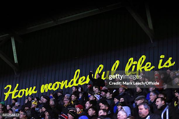 Lyrics from Elton John's 'Your Song' is seen as a backdrop on the Sir Elton John stand at Vicarage Road during the Sky Bet Championship match between...