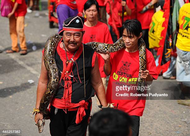 Members of Tatung perform during Cap Go Meh celebrations on March 5, 2015 in Singkawang, Kalimantan, Indonesia. The ancient art of Tatung, performed...