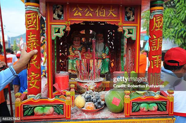 Member of Tatung prepares offerings to God during Cap Go Meh celebrations on March 5, 2015 in Singkawang, Kalimantan, Indonesia. The ancient art of...