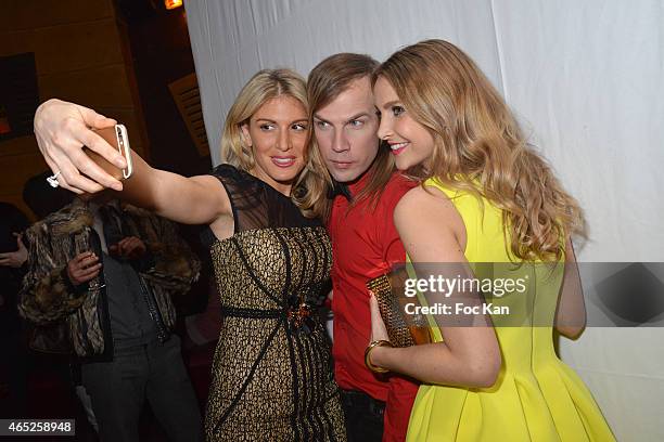 Hofit Golan, Christophe GuillarmeÊand Sophie HermannÊpose for a selfie during the Christophe Guillarme show as part of the Paris Fashion Week...