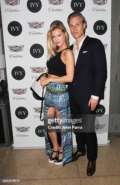Model Joy Corrigan and Philipp Triebel attend the Miami Innovator Dinner Presented By Cadillac And IVY at The Betsy Hotel on March 4, 2015 in Miami,...