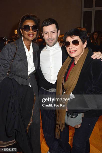 Former Yves Saint Laurent top model Mounia, Alexis Mabille and Paquita Paquin attend the Backstage of Alexis Mabille show as part of the Paris...