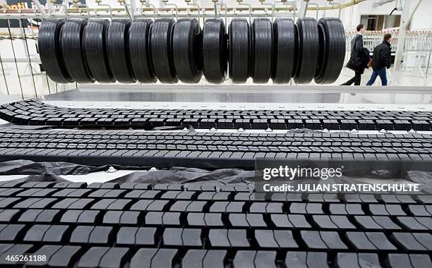 Picture taken on November 19 shows used tyres destinated for recycling in a factory of German automotive manufacturing company Continental AG in...