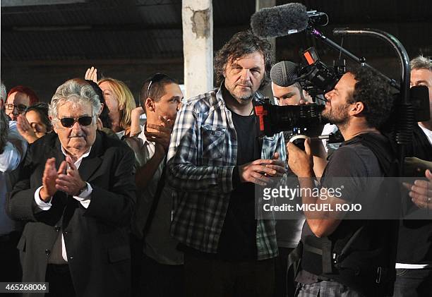 Former Uruguayan President and current Senator José Mujica is recorded by award-winning Serbian filmmaker Emir Kusturica during the inauguration of...