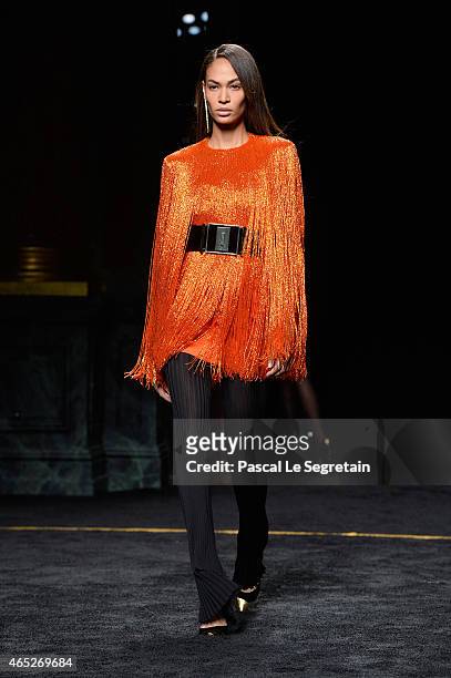 Model Joan Smalls walks the runway during the Balmain show as part of the Paris Fashion Week Womenswear Fall/Winter 2015/2016 on March 5, 2015 in...