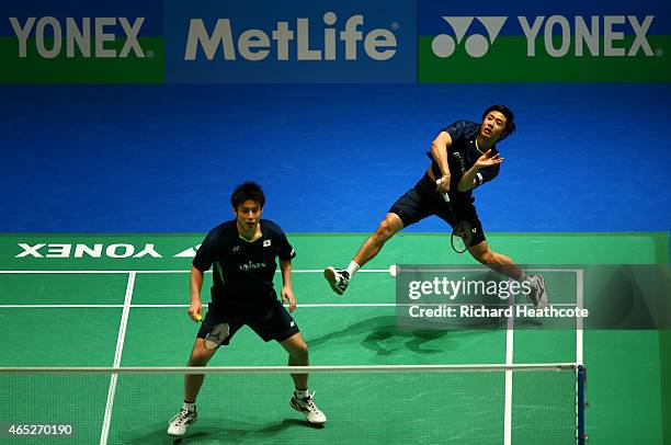 Kenichi Hayakawa and Hiroyuki Endo of Japan in action on their way to winning their doubles match against Chi-Lin Wang and Chen Hung Ling of Chinese...