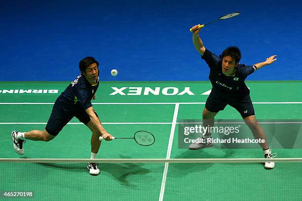 Kenichi Hayakawa and Hiroyuki Endo of Japan in action on their way to winning their doubles match against Chi-Lin Wang and Chen Hung Ling of Chinese...