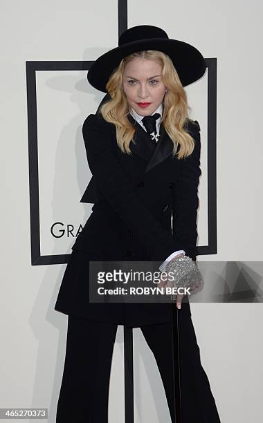 Performer Madonna arrives on the red carpet for the 56th Grammy Awards at the Staples Center in Los Angeles, California, January 26, 2014. AFP PHOTO...